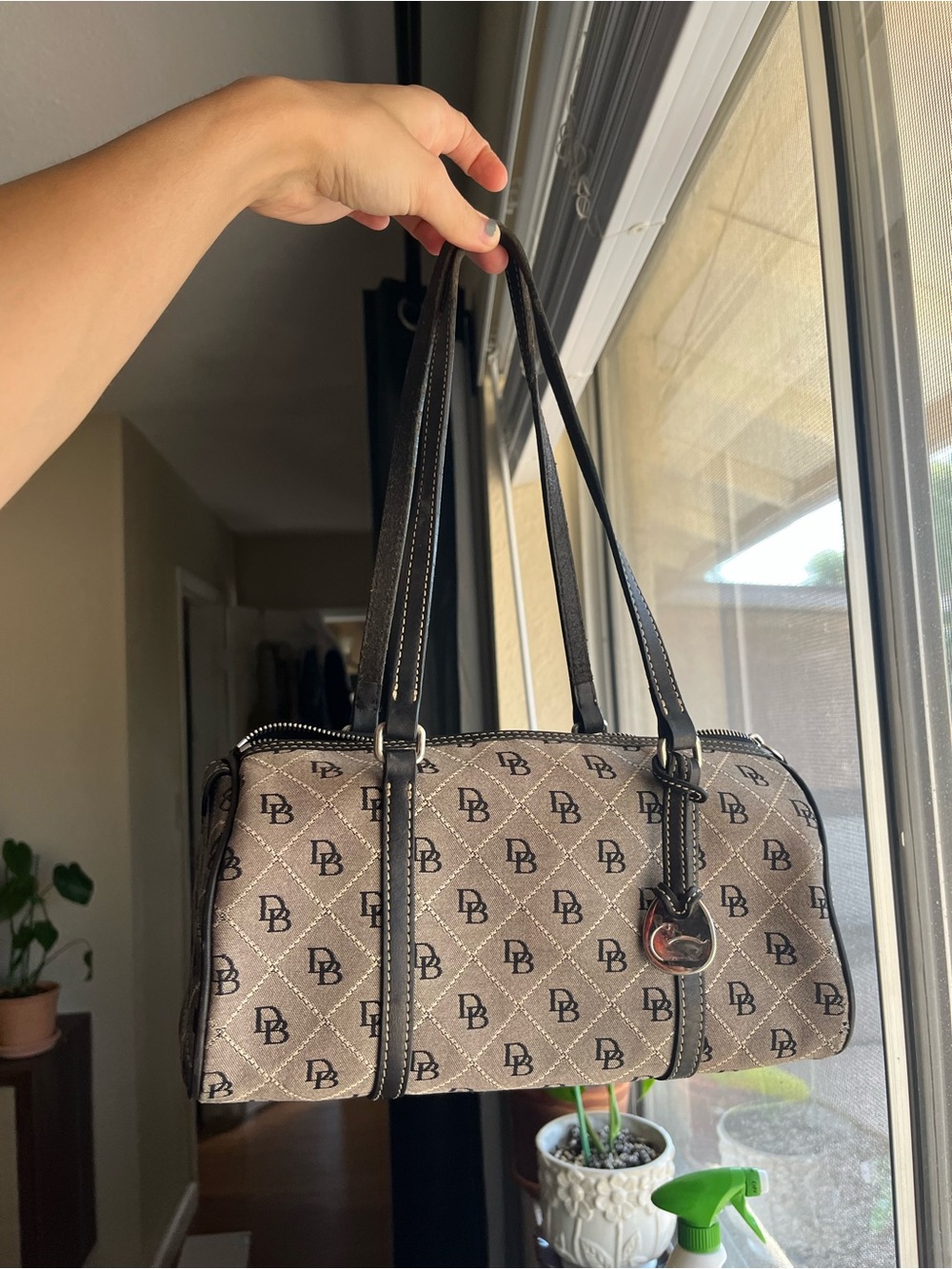 Dooney & Bourke Beige and Black Monogram Barrel Bag with Charm